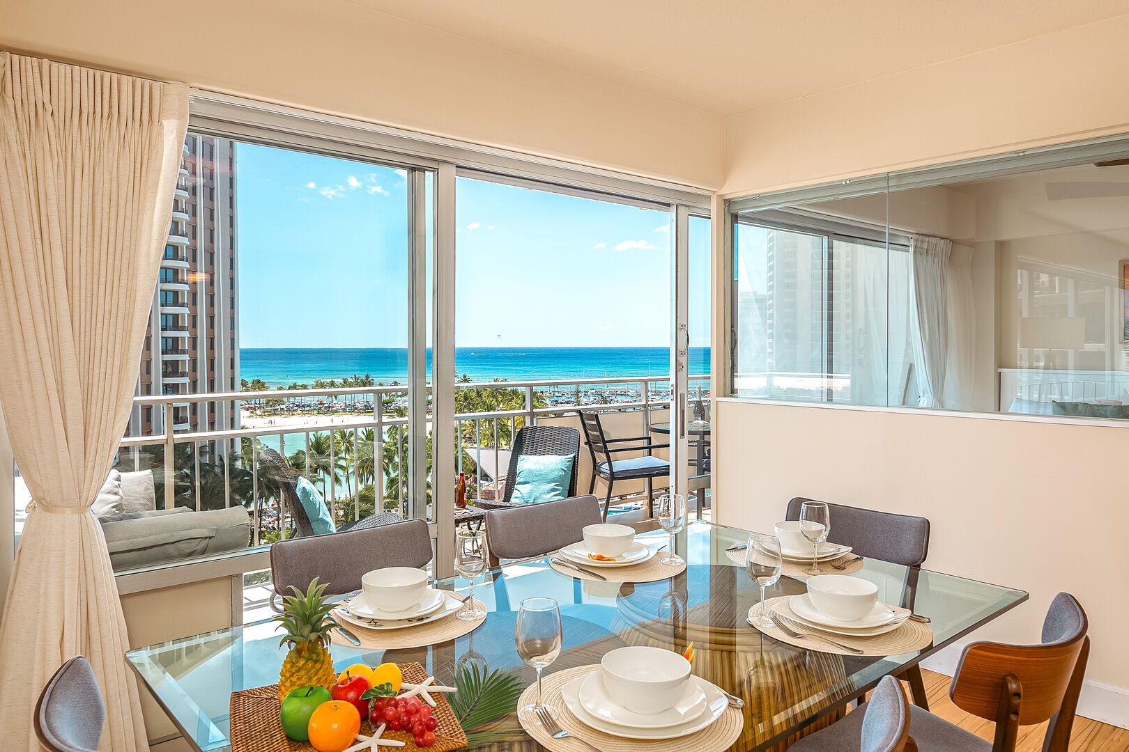 Enjoy shared meals at the dining table with 6 chairs, and a beautiful ocean view.