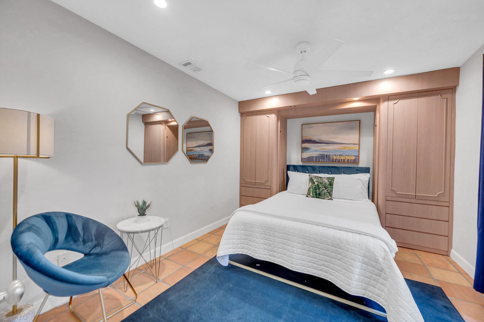 The third bedroom features a queen size bed and a separate patio.