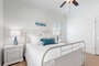 1st Guest Bedroom with comfortable queen size bed and coastal decor