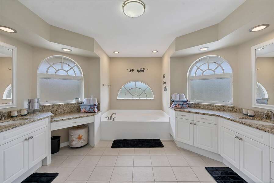 Large ensuite with walk-in shower, soaking tub and double vanities