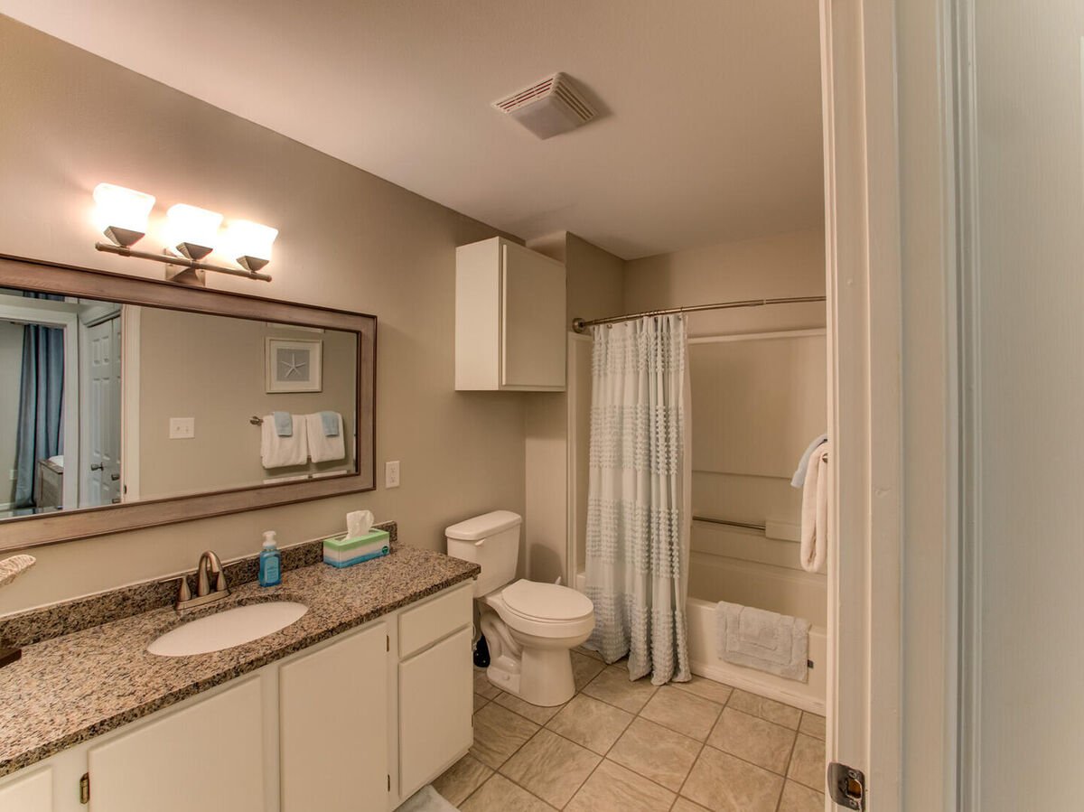 The guest bathroom mimics the ambience and luxury of the King Suite private bathroom, allowing you to immerse yourself in a space tailored for relaxation and rejuvenation.