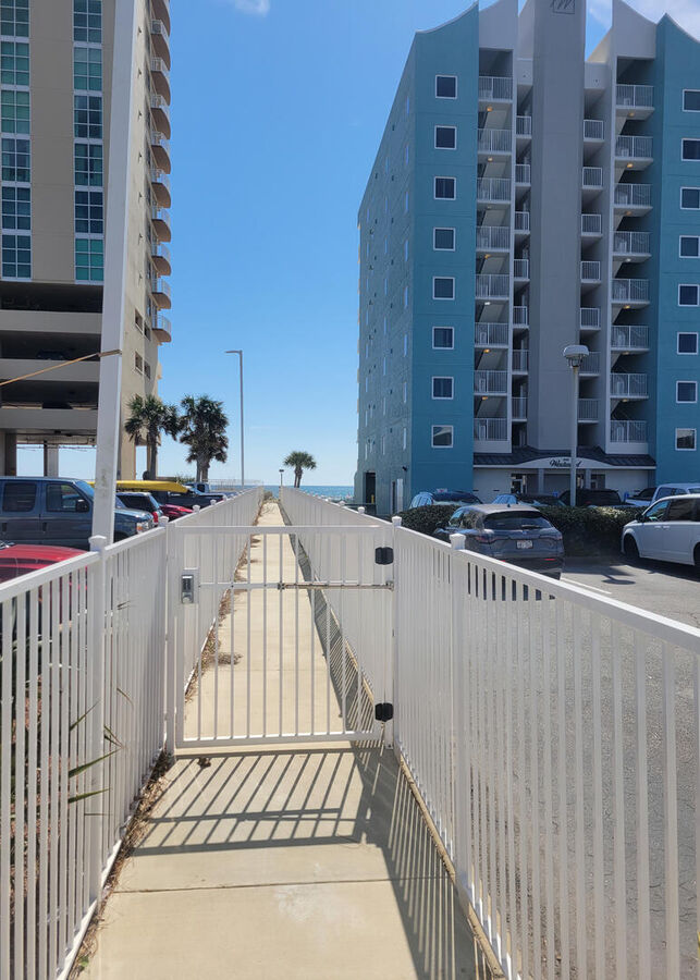 The beach access is located across the street from the community and has a coded gate for entry.