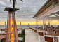 Enjoy a romantic meal on the back patio overlooking the beach at Coastal Restaurant in nearby Orange Beach, AL