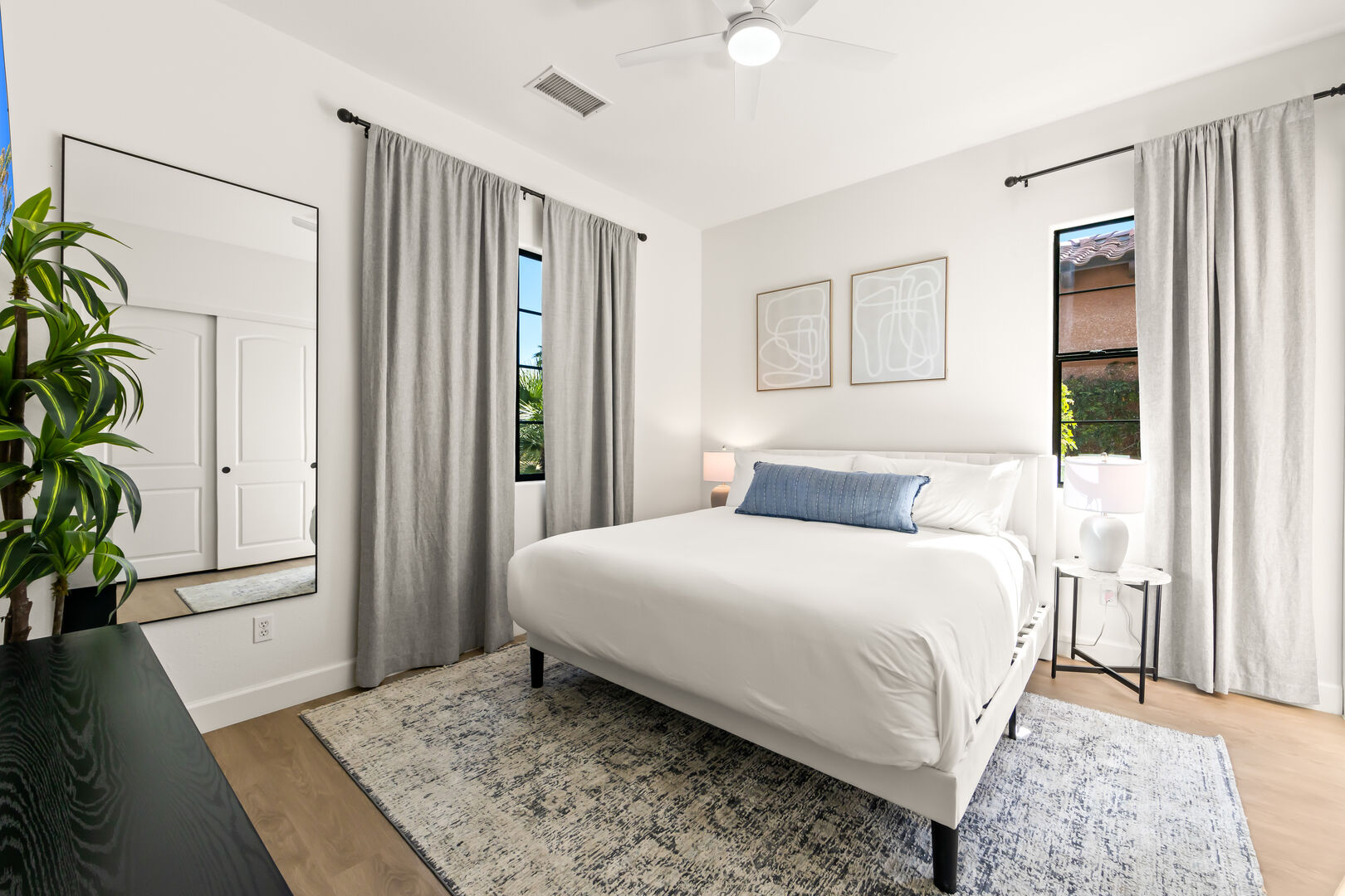 With private access to and from the courtyard, this bedroom offers both comfort and convenience for those seeking more privacy.