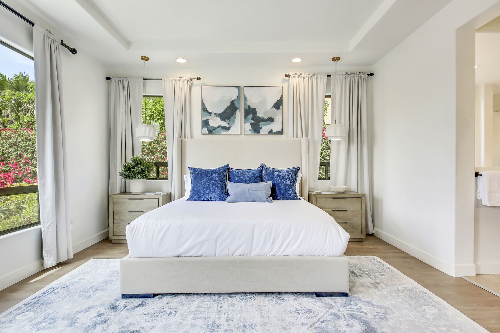 Master Suite 1, situated adjacent to the open media space, features a King-sized Bed!