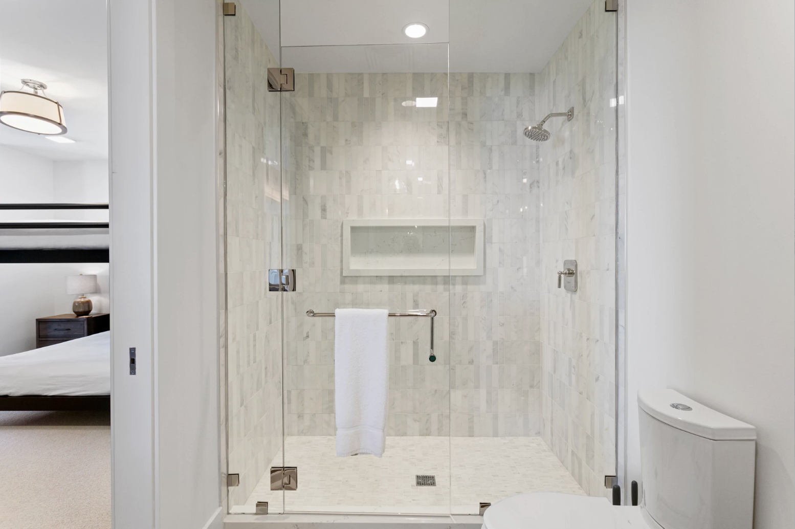 Ensuite bathroom with spacious shower.