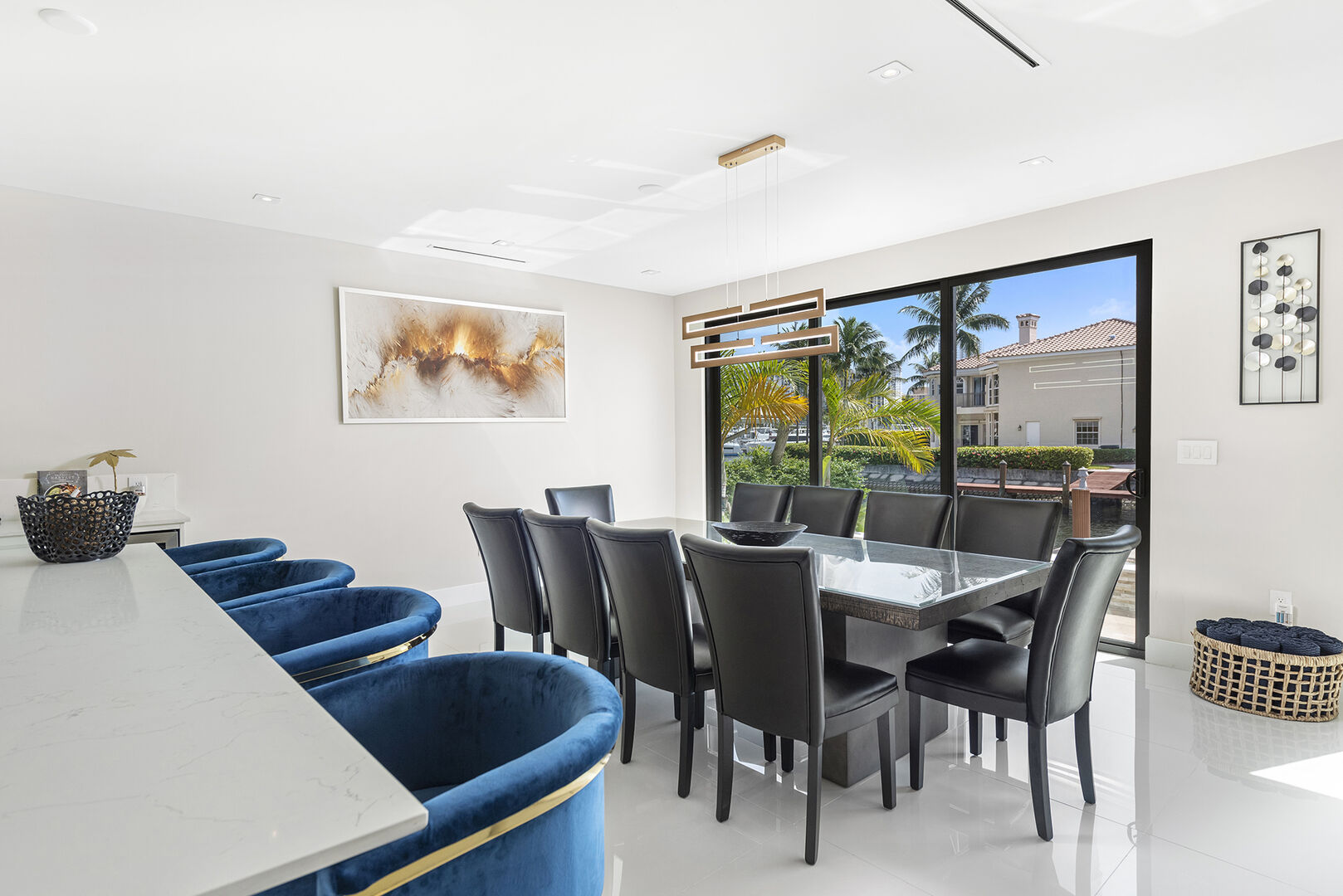 Dinning room in the ample open space living area offers canal views.