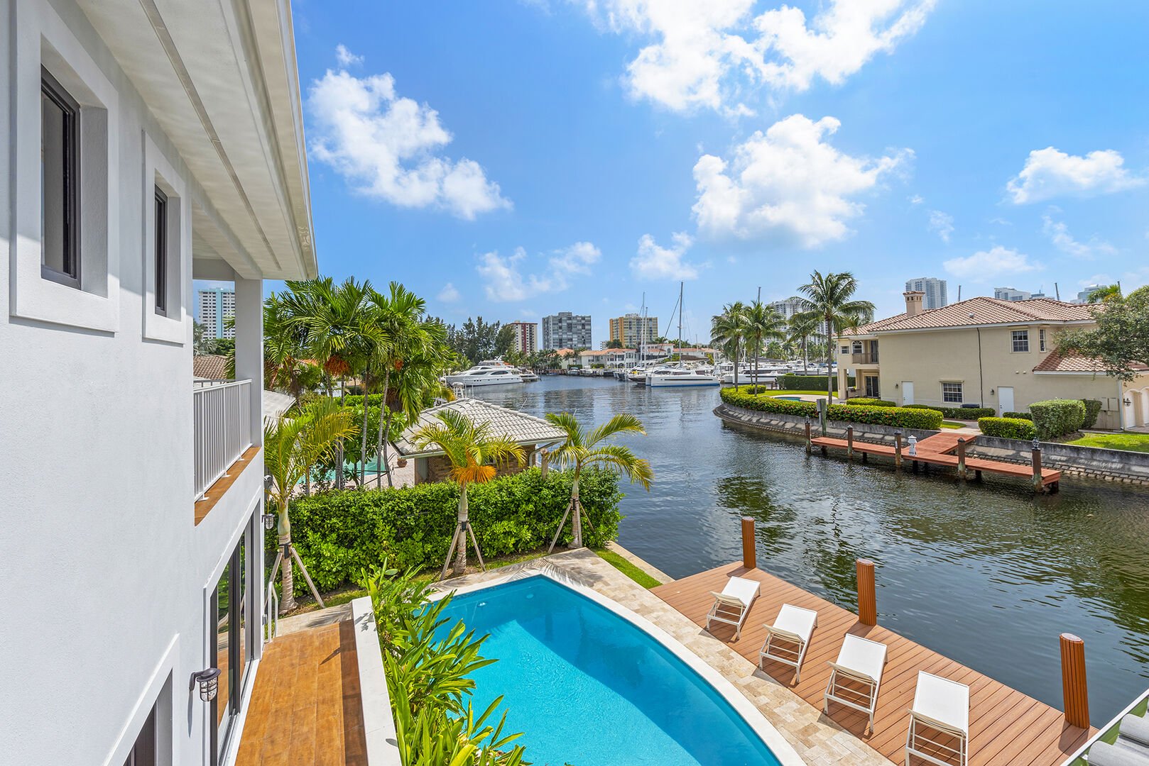 The balcony off the third bedroom showcases canal views just off the Intracoastal waterway.