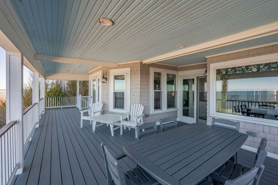 Outdoor dining and seating area to take in the views of Cape Cod Bay - 12 Indian Trail - New England Vacation Rentals
