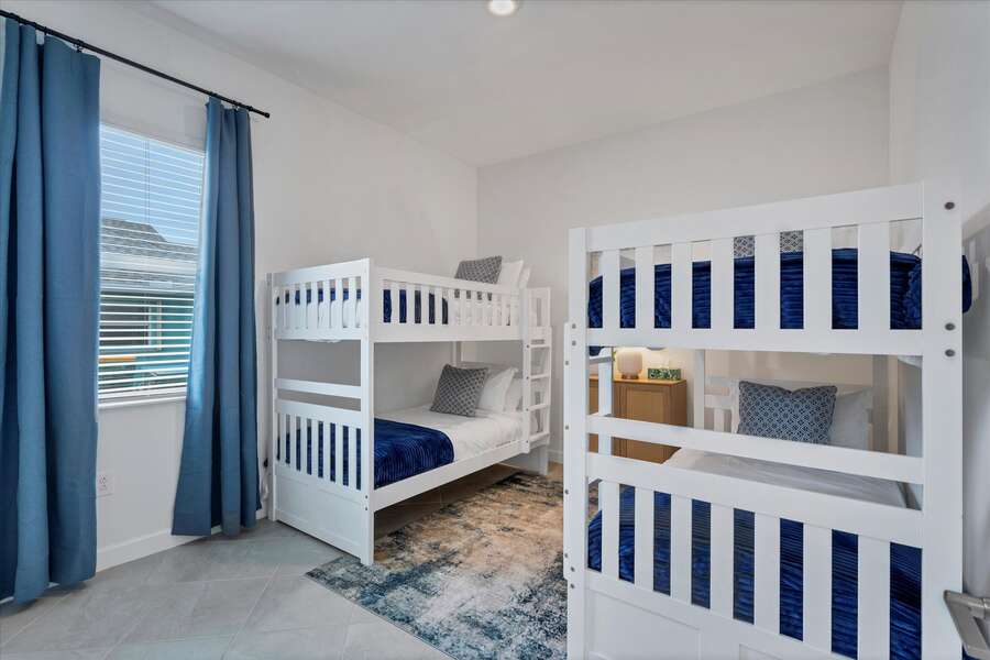 Sleep 4 in this bedroom with two sets of bunk beds