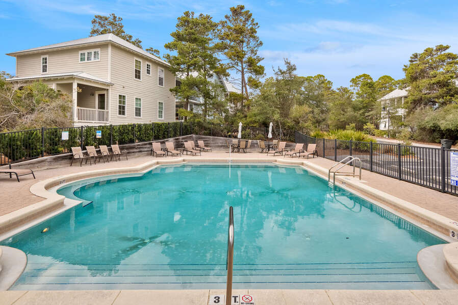 Seasonally heated and chilled community pool with plenty of lounge chairs.