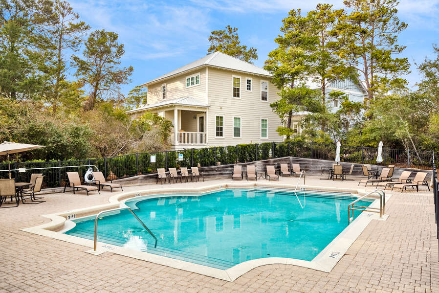 Seasonally heated and chilled community pool with plenty of lounge chairs.