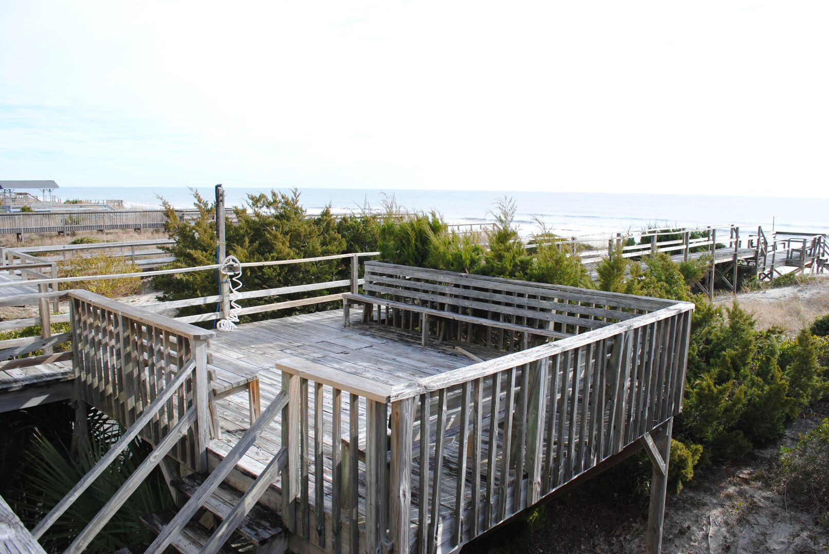 Walkway to beach with decks and outside shower