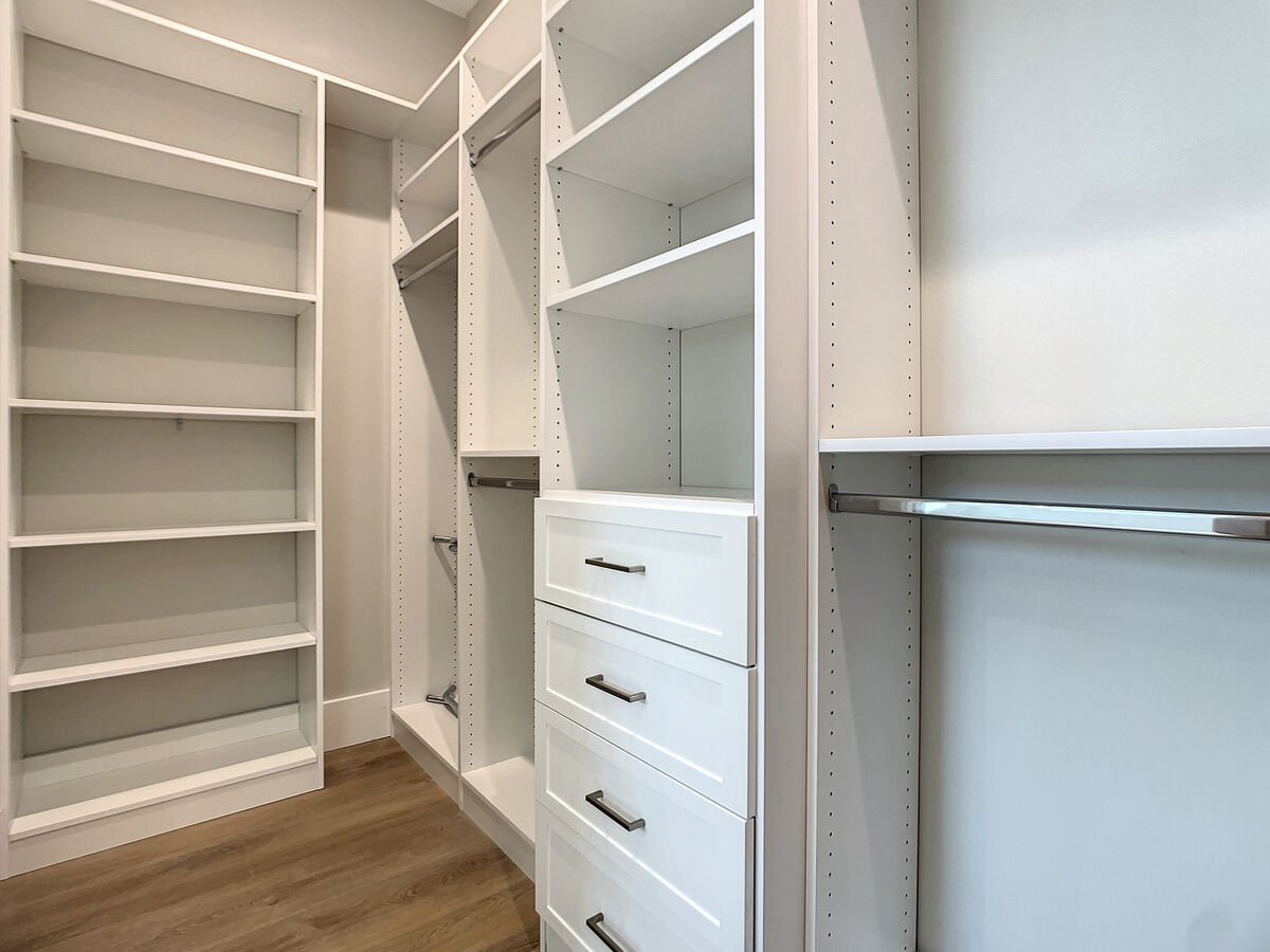 Discover the ultimate in storage luxury in our master bedroom walk-in closet, where organization meets elegance for your comfort.