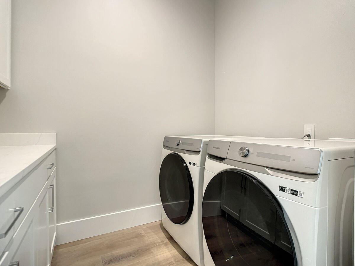 Our upstairs laundry room is the perfect amenity for guests, providing a convenient space to refresh clothes for more adventures.