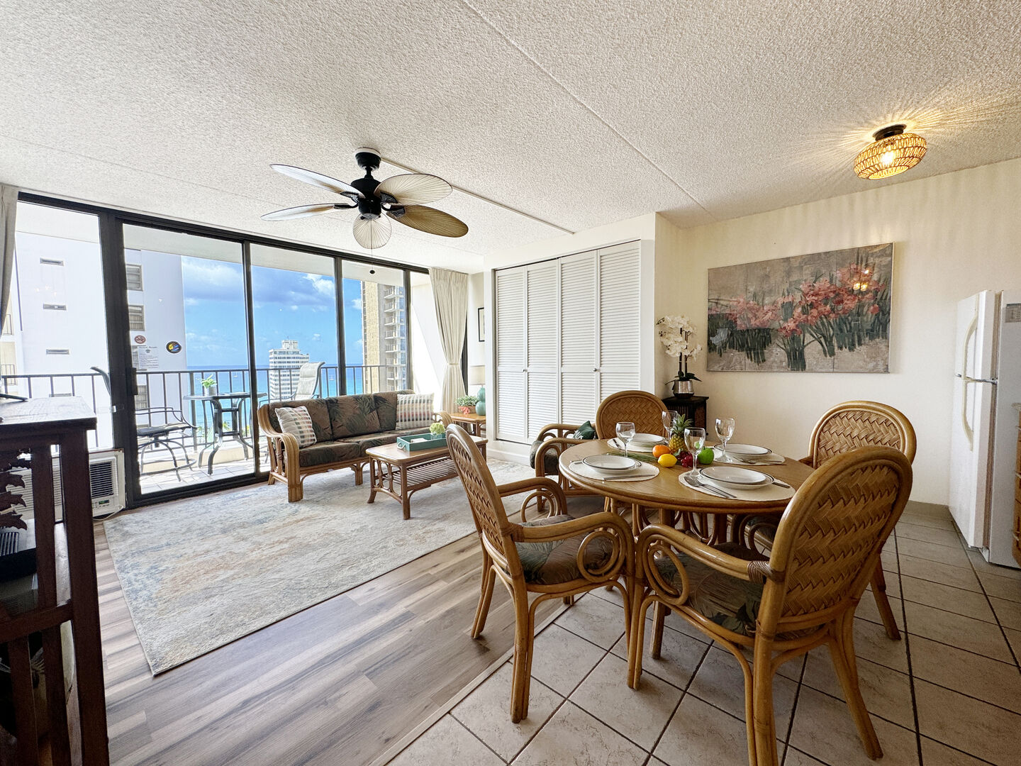 The dining area has a dining table with 4 chairs and with a beautiful ocean view.