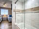 Shower tub combination. Access to guest bedroom.
