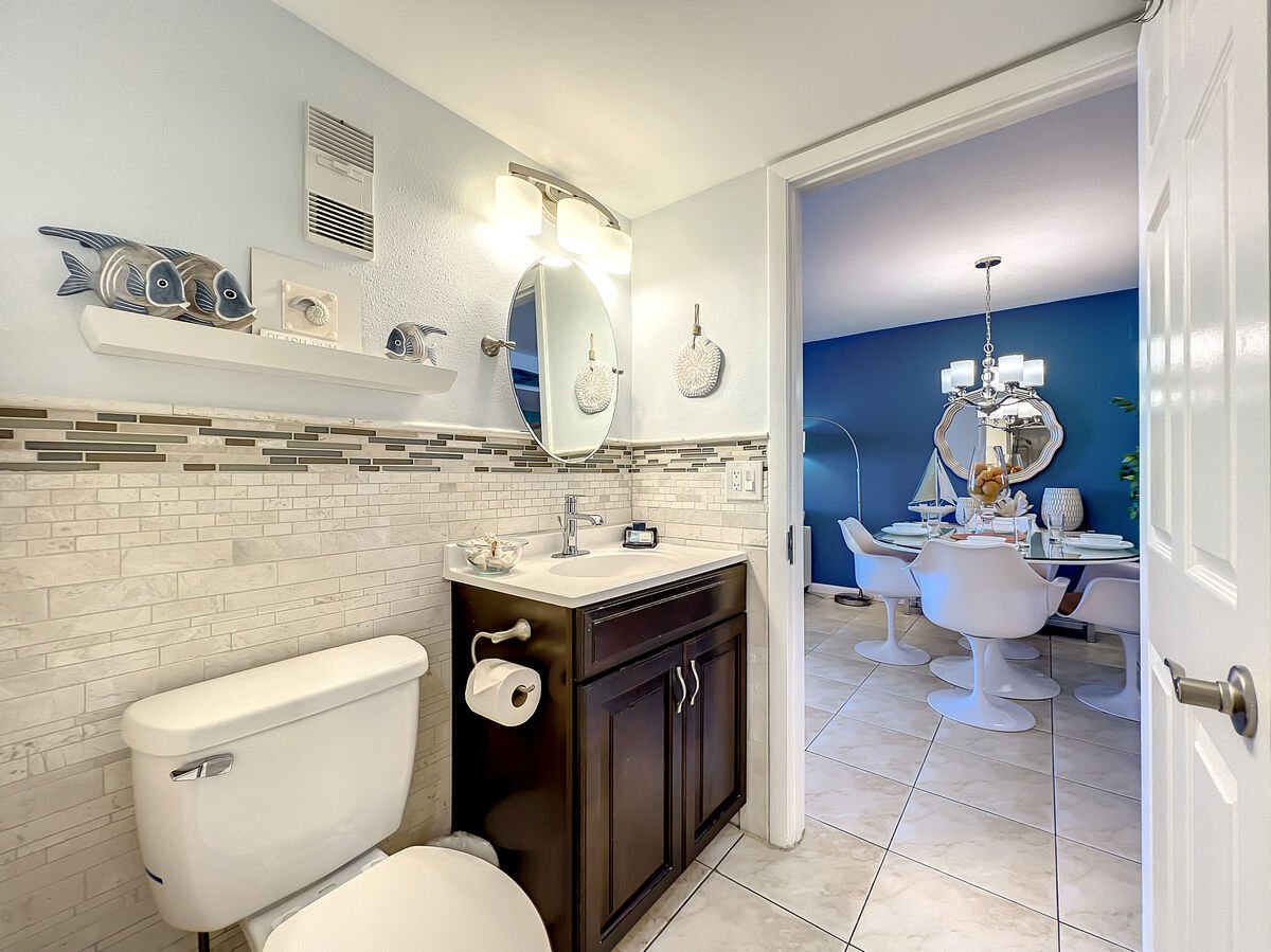 Convenience meets comfort! The guest bathroom provides easy access from both the guest room and living area.