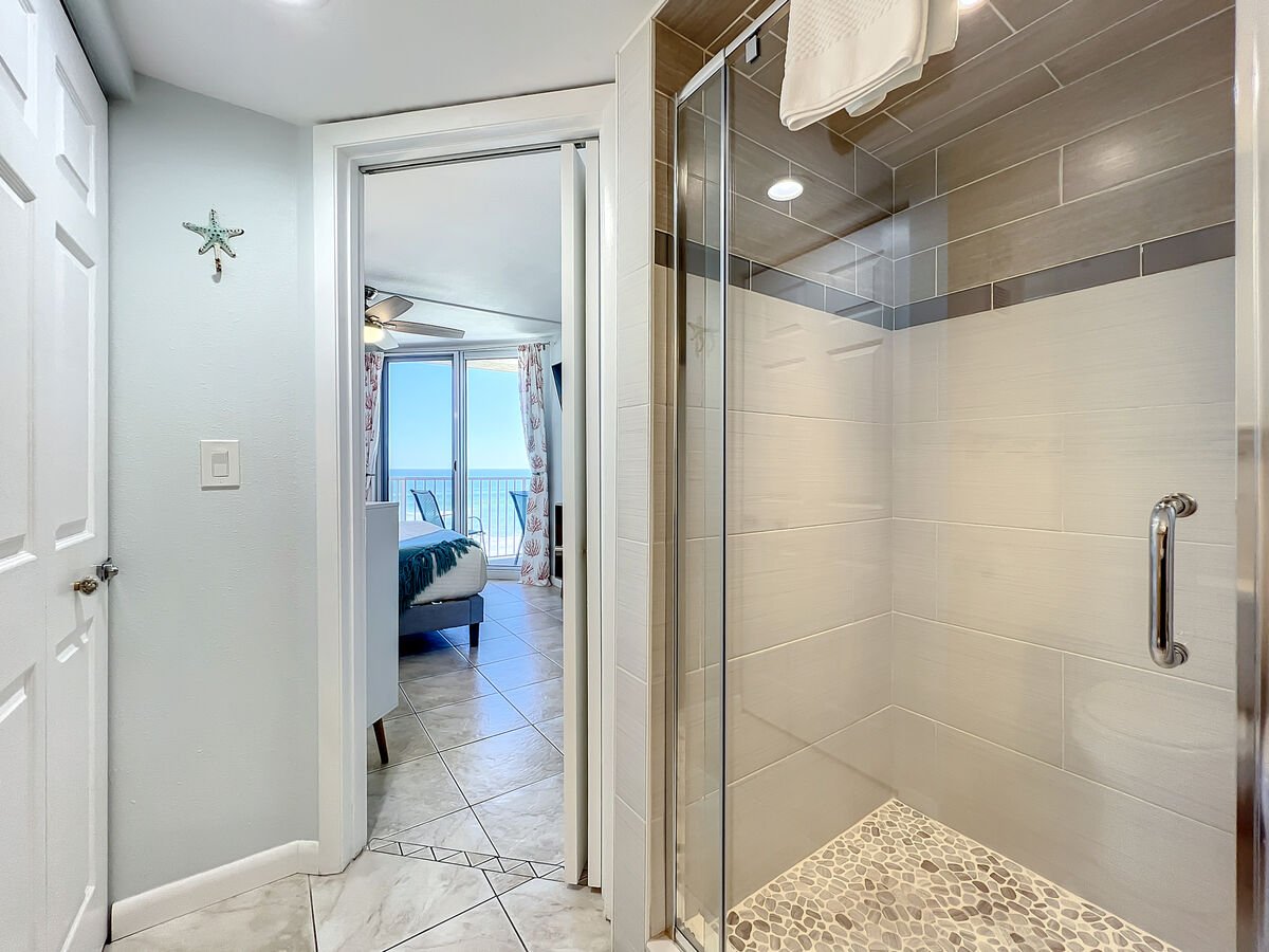 Walk in shower and access to master bedroom.