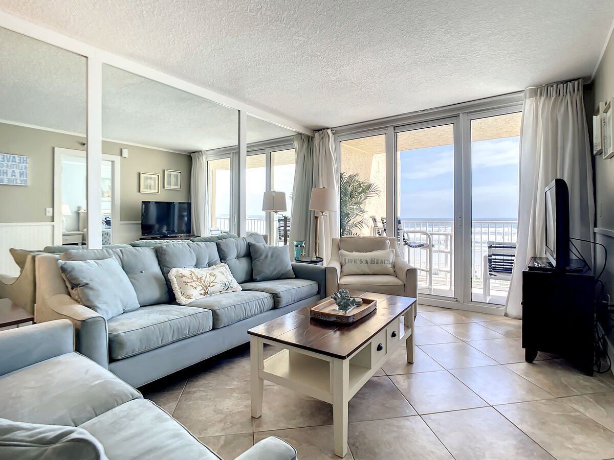 Living room looks out into the ocean. Cozy seating for 5.