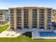 Back view of Oceania Plaza showing our pool area and oceanfront properties.