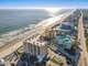 Marvel at the beauty from above! Enjoy aerial views of our oceanfront building, surrounded by the splendor of the sea.