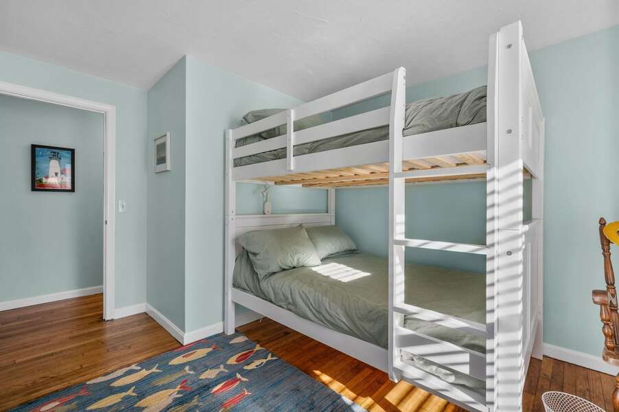 Bedroom #1 provides a whimsical ocean theme and Full over Full sized bunk beds that can also sleep smaller adult guests - 14 Quail Nest Run Harwich Cape Cod-Hawksnest Hideaway-NEVR
