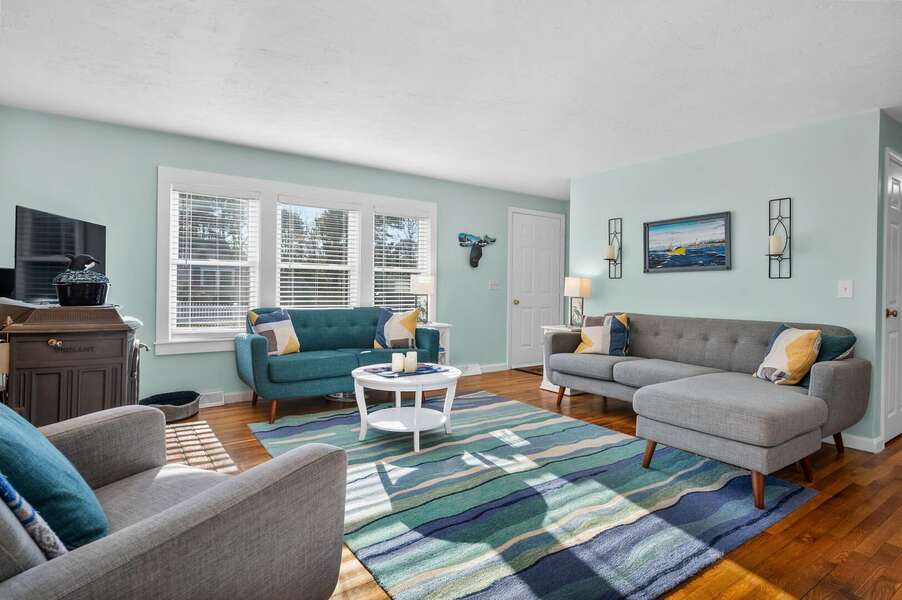 Bright and comfortable living room with flat screen TV and ample seating - 14 Quail Nest Run Harwich Cape Cod-Hawksnest Hideaway-NEVR