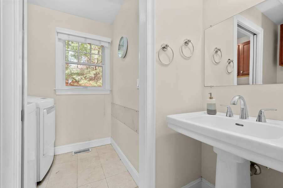 Convenient half bathroom (#3) on the main level that includes laundry - 9 Alonzo Road Harwich Port Cape Cod - Don't Think Twice - NEVR