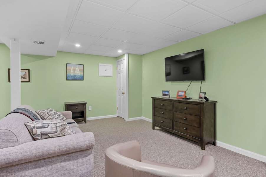Comfortable seating area and flat screen TV allows for different age groups to enjoy their own streaming content - 9 Alonzo Road Harwich Port Cape Cod - Don't Think Twice - NEVR