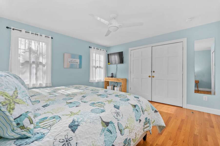 Flat screen TV and spacious storage make this primary bedroom (#1) an ideal home away form home - 9 Alonzo Road Harwich Port Cape Cod - Don't Think Twice - NEVR