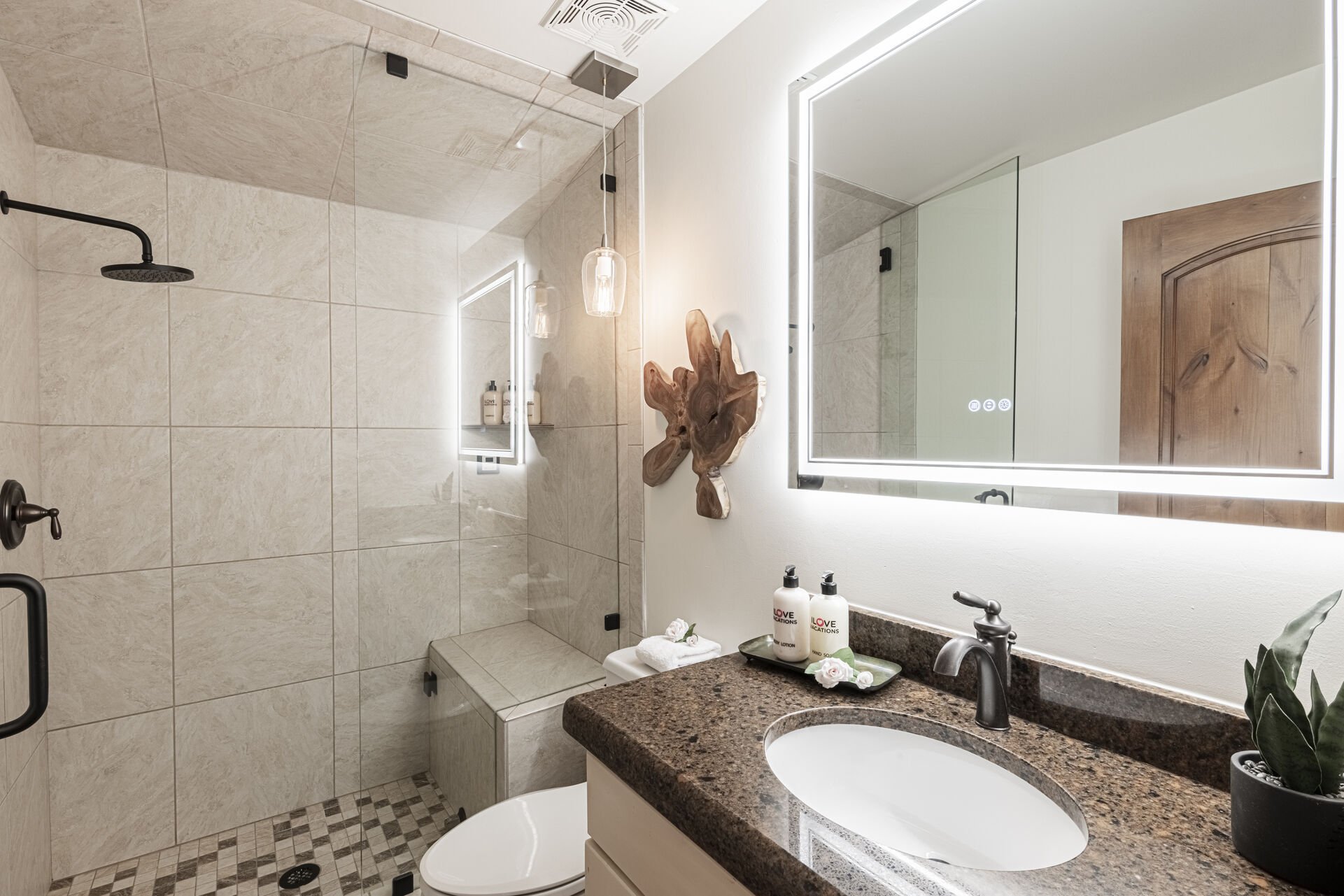 Full Shared Bathroom with a Tile / Glass Shower