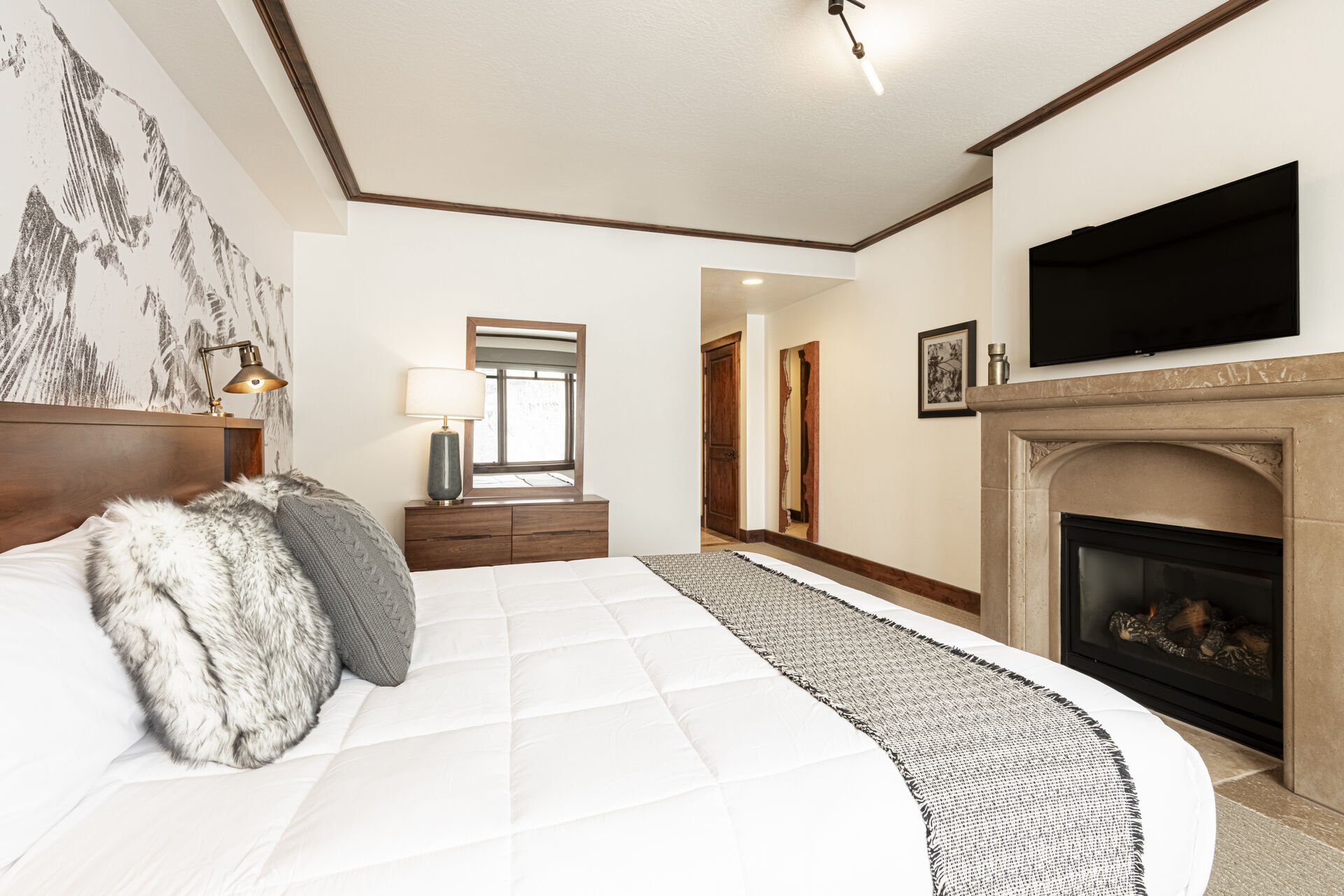 Master Suite (Unit A) with king bed, gas fireplace, LG TV with Xfinity cable and ensuite bathroom