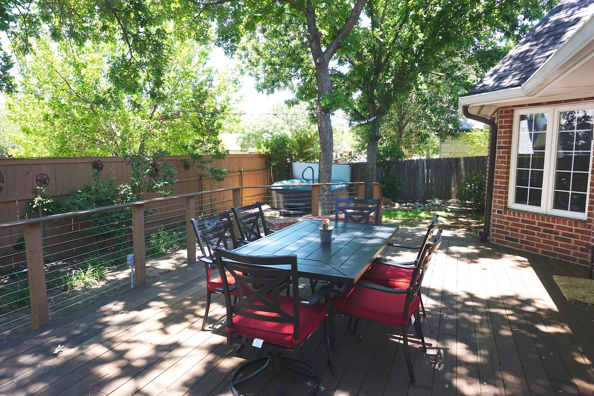 Enjoy meals and conversation outdoors on our expansive deck.