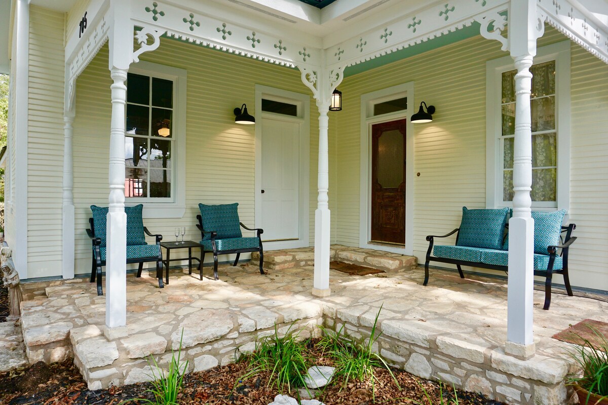 Relax on the front porch of the Victorian house, a charming spot to sip morning coffee or watch the sunset over the horizon
