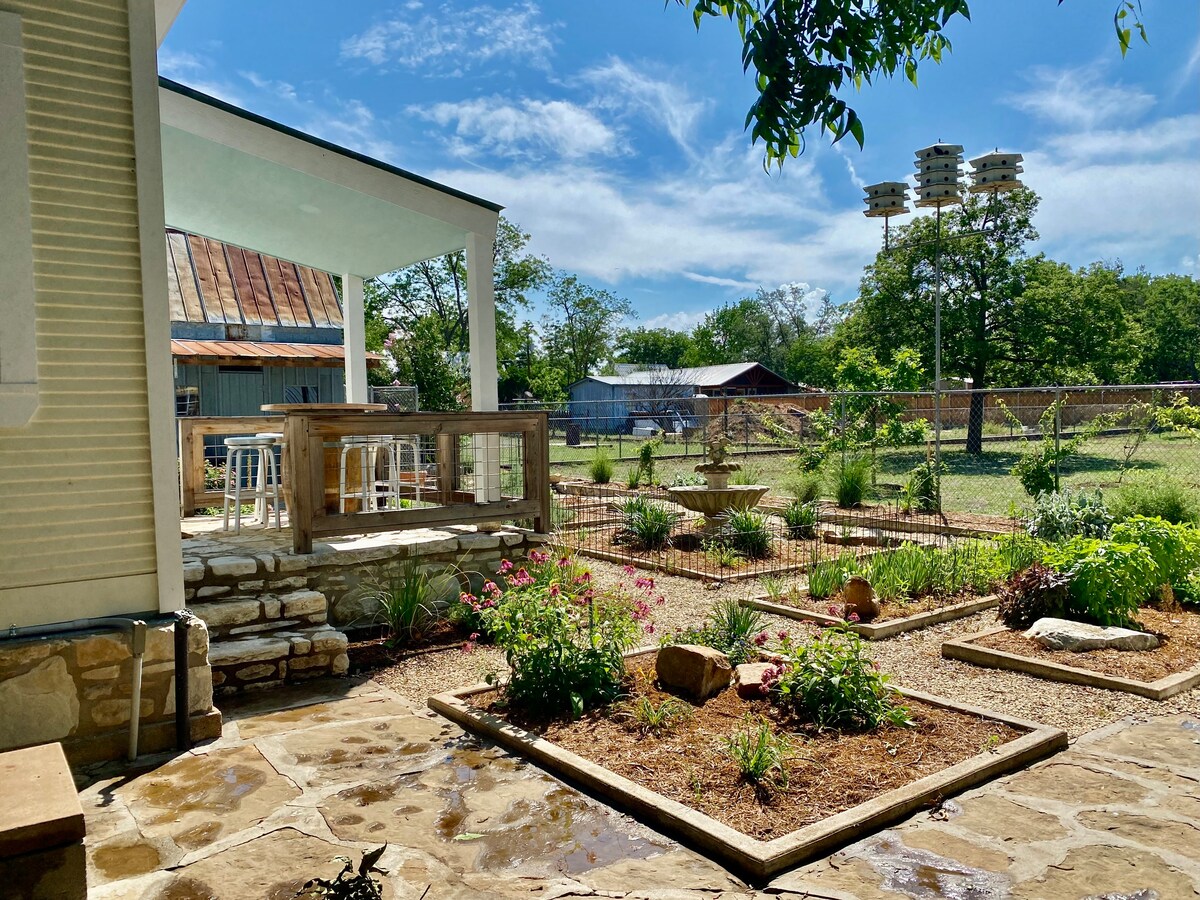 Indulge your green thumb in the vegetable garden, where heirloom tomatoes, fragrant herbs, and crisp lettuce flourish under the Texas sun