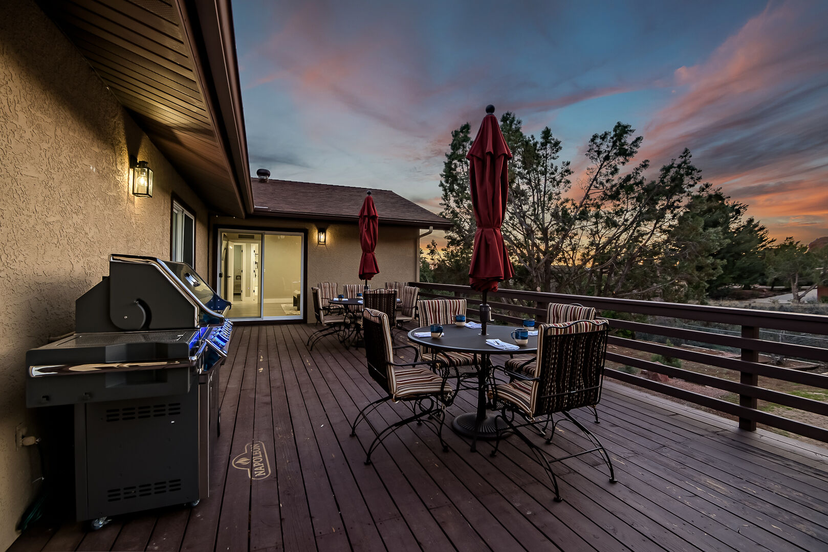 Patio deck offers plenty of seating to enjoy the direct red rock views and propane BBQ grill