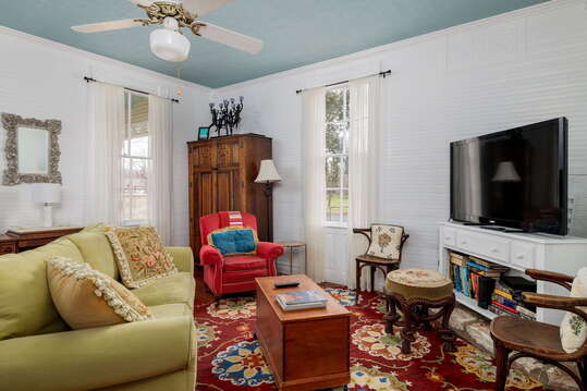 Gather with loved ones in the inviting living room, featuring comfortable seating and stylish décor accents that exude casual elegance