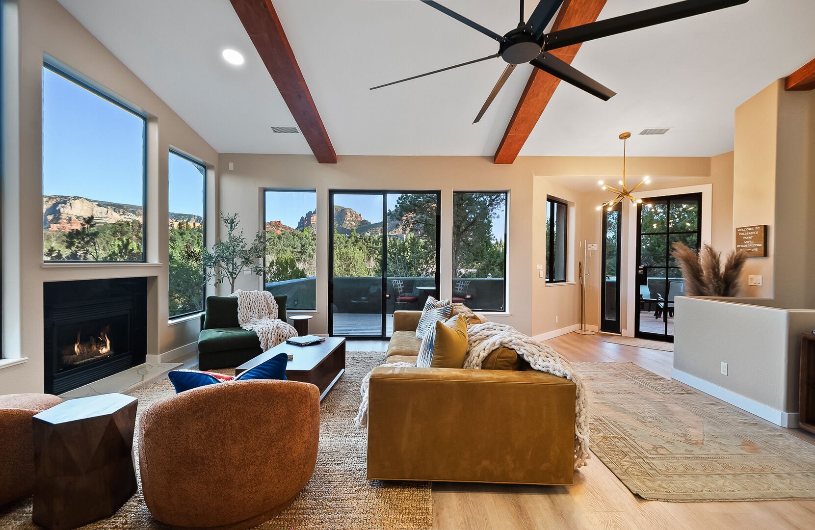 High Wood Beam Ceilings and Tons of Windows to Bring in the Natural Lighting!