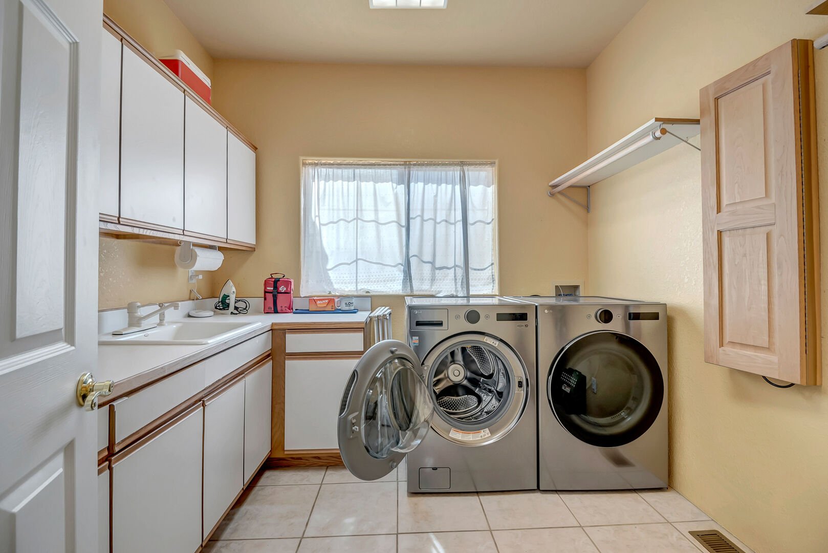 Laundry room with full-size washer & dryer