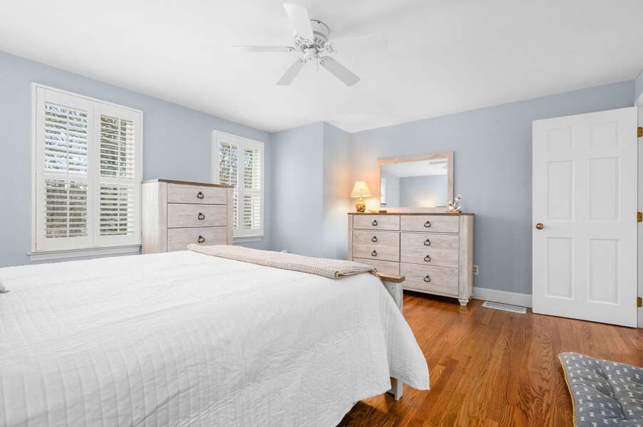 Plenty of storage and space to spread out in the main level Primary bedroom (#1) offering a Queen sized bed - 853 Route 28 Harwich Port Cape Cod - Sandy Spot
