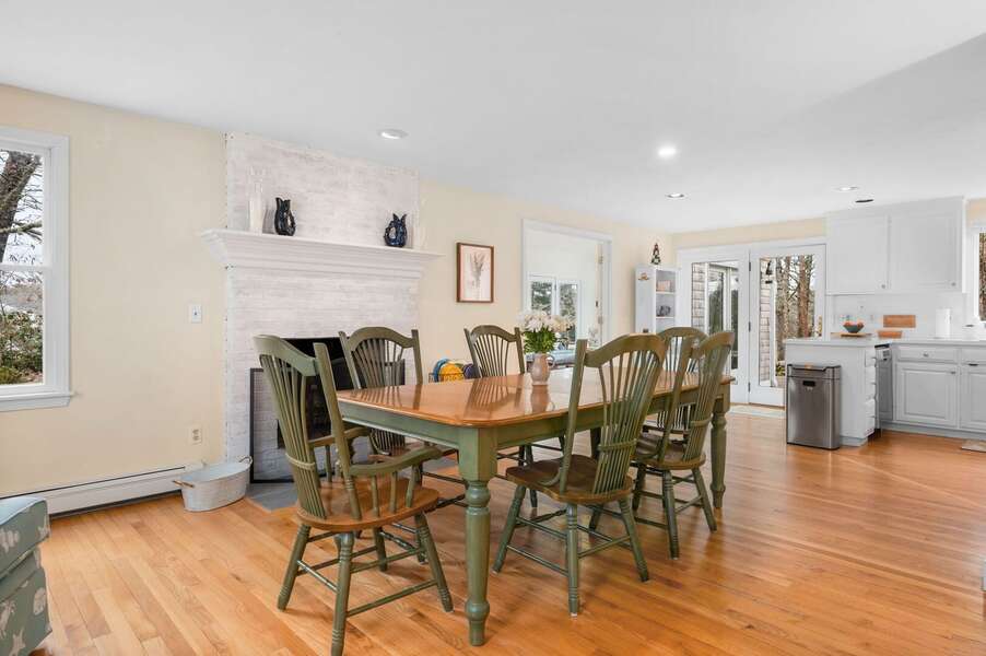 Dining near the decorative fireplace and close to the kitchen as well - 853 Route 28 Harwich Port Cape Cod - Sandy Spot