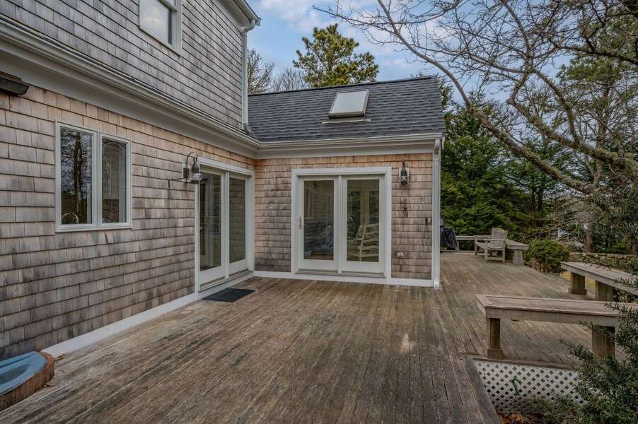 Plenty of space to enjoy on the expansive deck (outdoor furniture away for the winter!) - 853 Route 28 Harwich Port Cape Cod - Sandy Spot