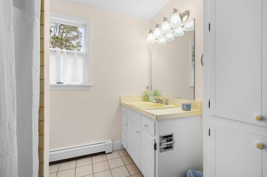 Bathroom #3 is on the upper level and features a tub/shower combination - 853 Route 28 Harwich Port Cape Cod - Sandy Spot