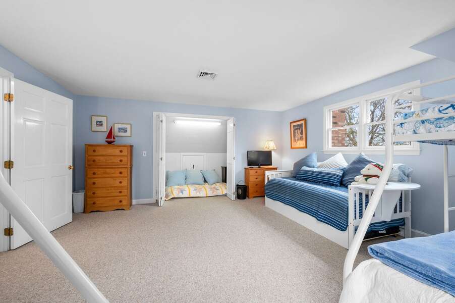 With storage on either side, the closet also provides a cozy enclave within which you can enjoy a book or even a nap - 853 Route 28 Harwich Port Cape Cod - Sandy Spot