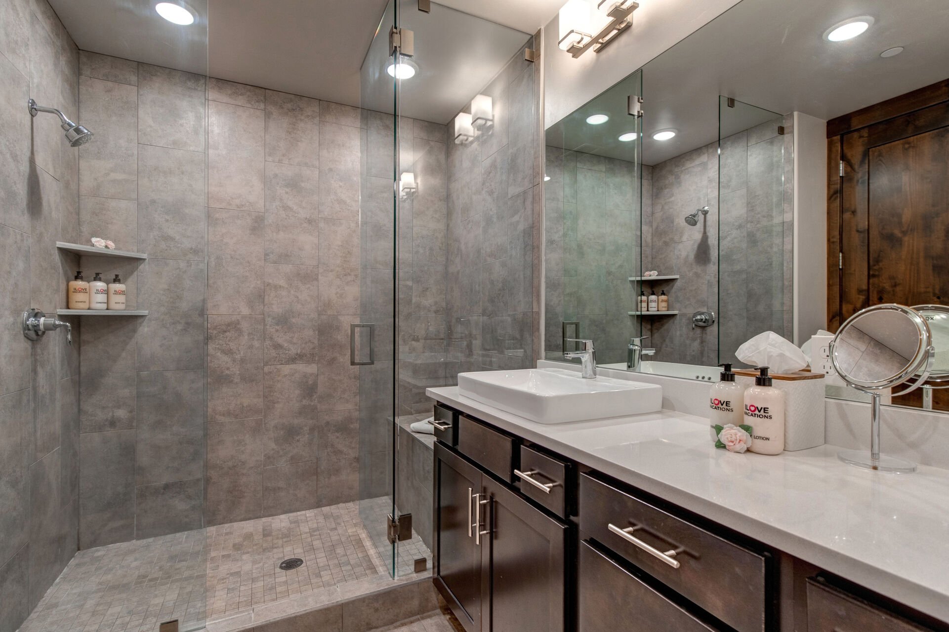Master bathroom with large shower and a dual-sink vanity