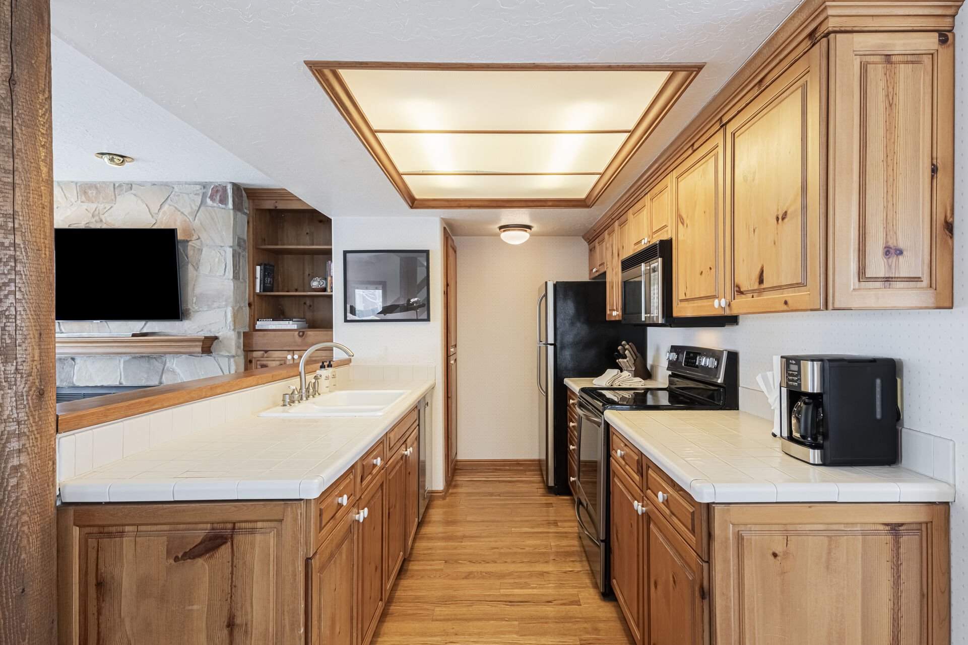 Fully Equipped Kitchen with Spacious Countertops and Stainless Steel Appliances
