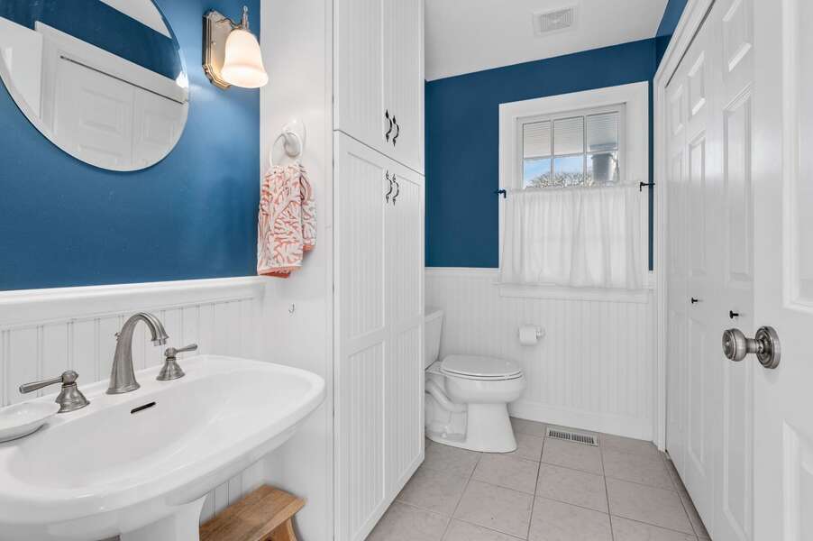 Convenient half bathroom (Bathroom #4) located in the hallway near the kitchen - 92 Hoyt Road Harwich Port Cape Cod - Apricari - NEVR