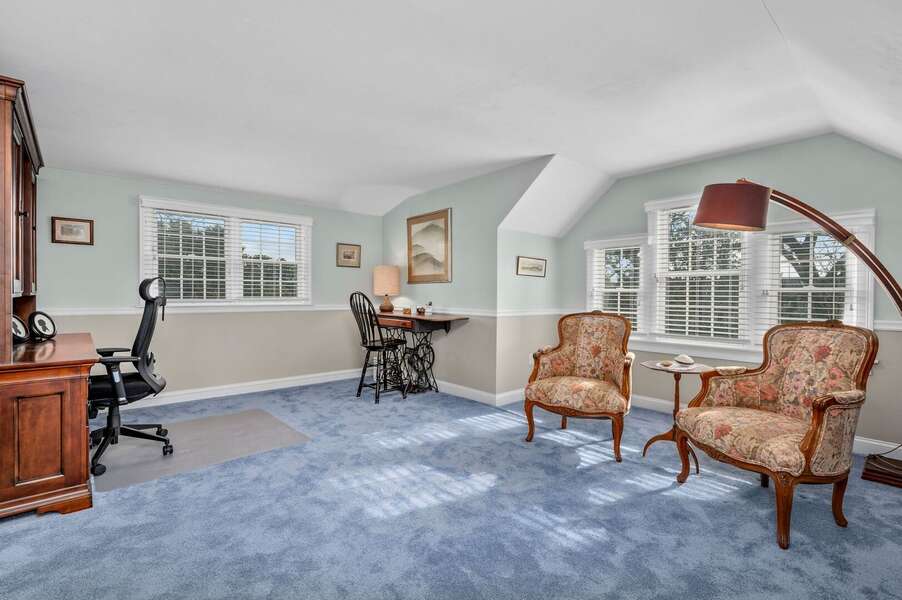 Bedroom #5 includes a sitting area with two chairs and two desks for the couple who needs remote work space - 92 Hoyt Road Harwich Port Cape Cod - Apricari - NEVR
