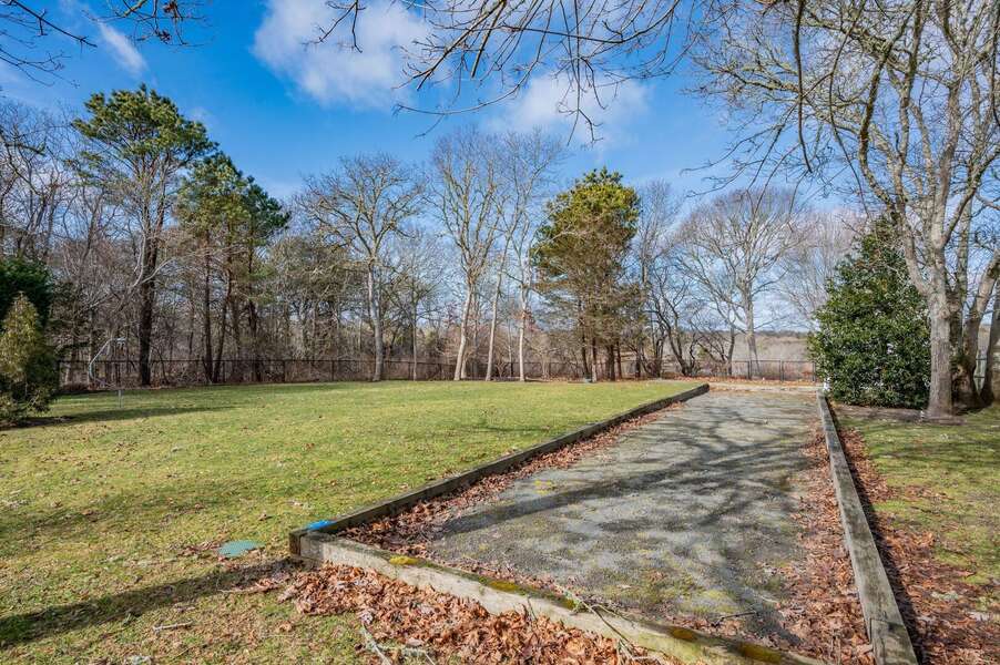 Bocce court area in the back yard (new photos to come in the Spring when plantings are in bloom!) - 92 Hoyt Road Harwich Port Cape Cod - Apricari - NEVR